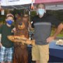 L to R: Remy Alff, the 2019 Barry Conservation Camp winner, the bear, and Leon Austin, the artist who carved the bear.