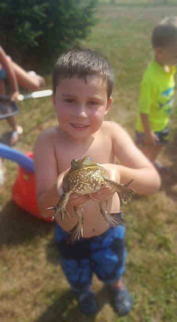 Landon with a huge frog
